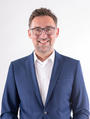 Das Pressefoto zeigt Dr. Jochen Zöschg, CEO Europäische Reiseversicherung